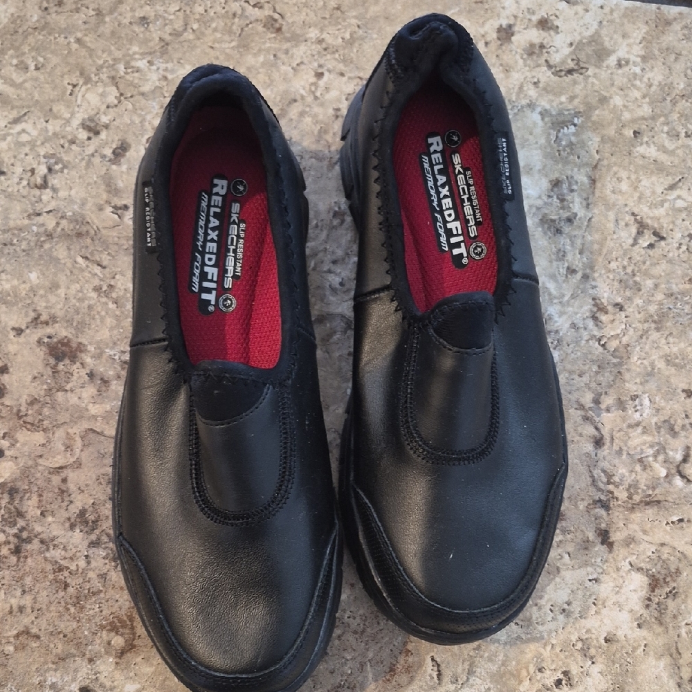 Skechers Kids Black Slip-On Relaxed Fit with Red Insole